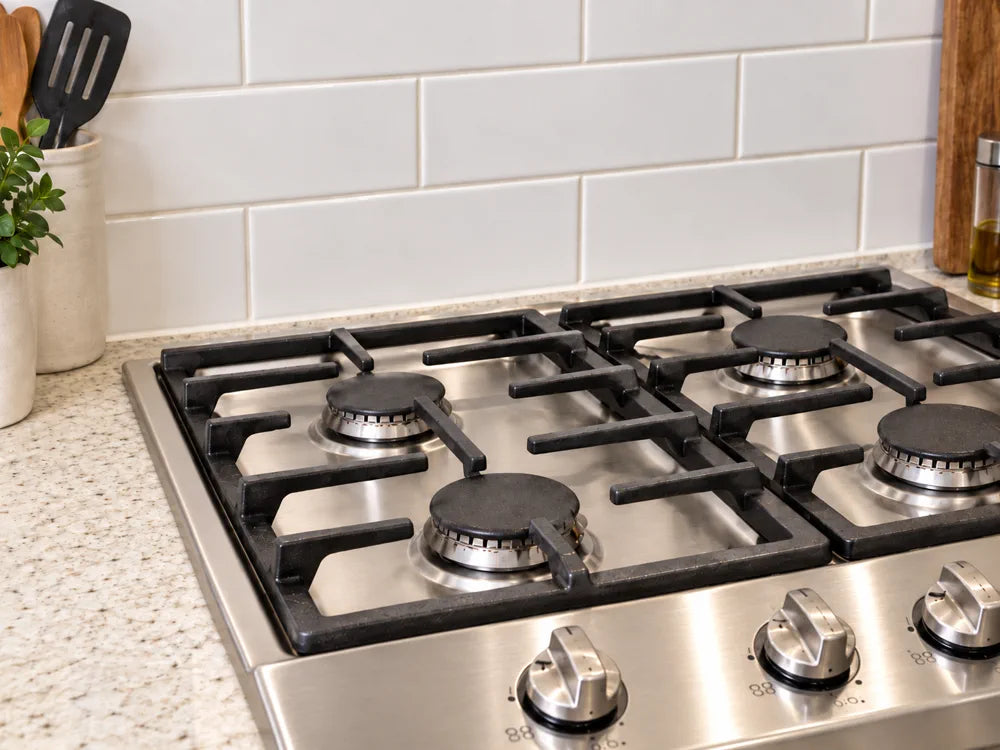 After cleaning cooktop surface and backsplash splatter