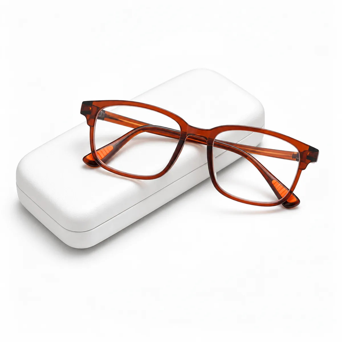 Amber anti-blue reading glasses displayed on a white case
