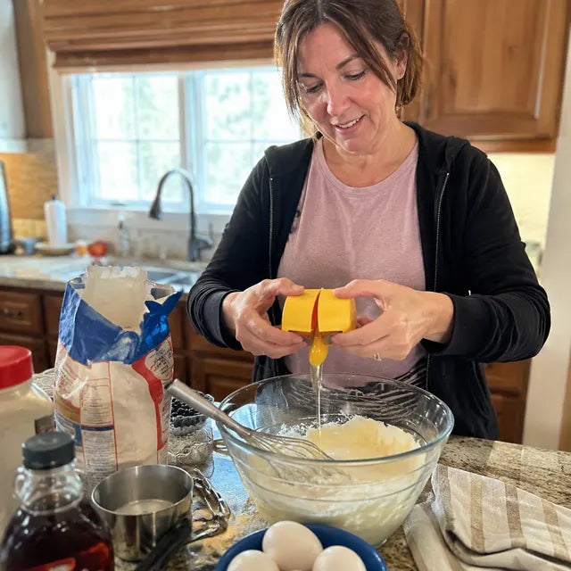 Customer using the Quick Egg Cracker Tool for baking